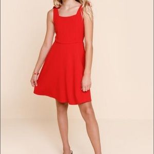 Red cocktail or party dress with bow detail